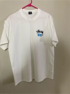 Stussy White Short-Sleeve Tee with Black Logo and Blue Graphic